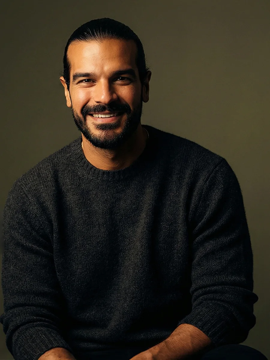 Seif Hanno, portrait in a dark sweater.
